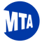 MTA logo with bold black “MTA” letters cut out from a solid blue circle on a transparent background.
