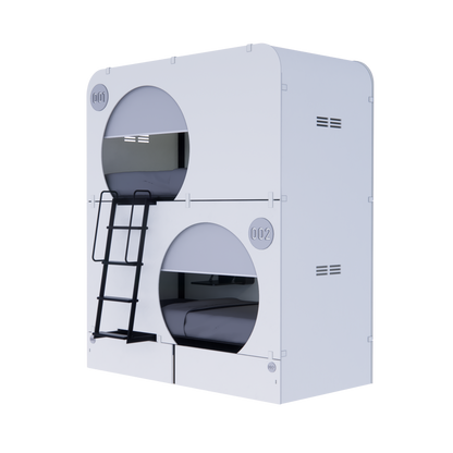 NapBox white Economy Bunk Bed Pod — compact sleeping pod unit with two stacked circular cabins, side angled view. Each pod features a mattress, divider privacy curtain, built-in fan, and clearly visible lit room numbers.