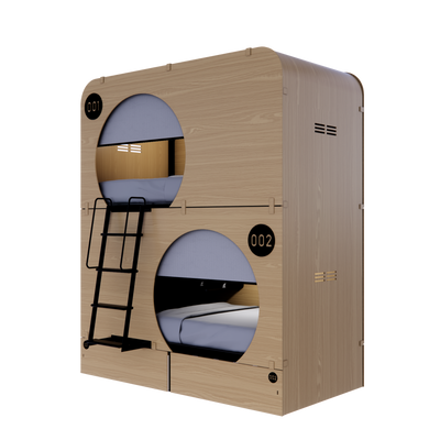 NapBox wood Economy Bunk Bed Pod — compact sleeping pod unit with two stacked circular cabins, side angled view. Each pod features a mattress, divider privacy curtain, built-in fan, and clearly visible lit room numbers.