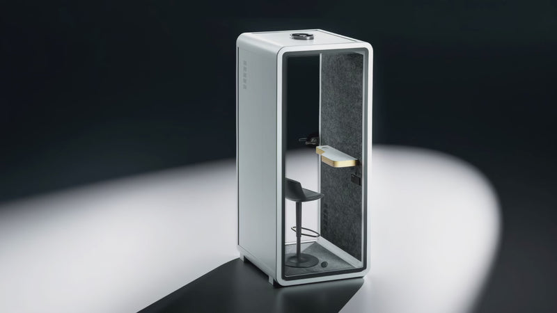360° rotating view of NapBox Soundbox Small Booth — single-person soundproof office phone booth with desk and stool.